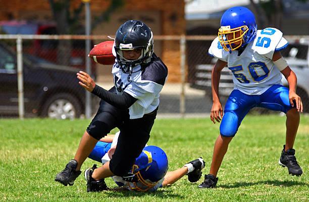 Boys playing football